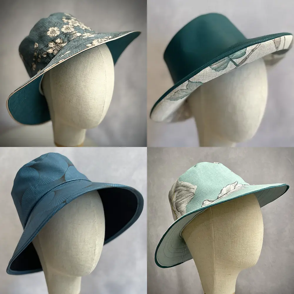 Quatre chapeaux en tissu turquoise